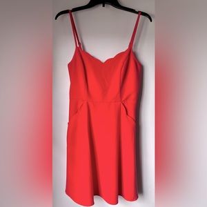 Coral red summer dress with pockets and keyhole back